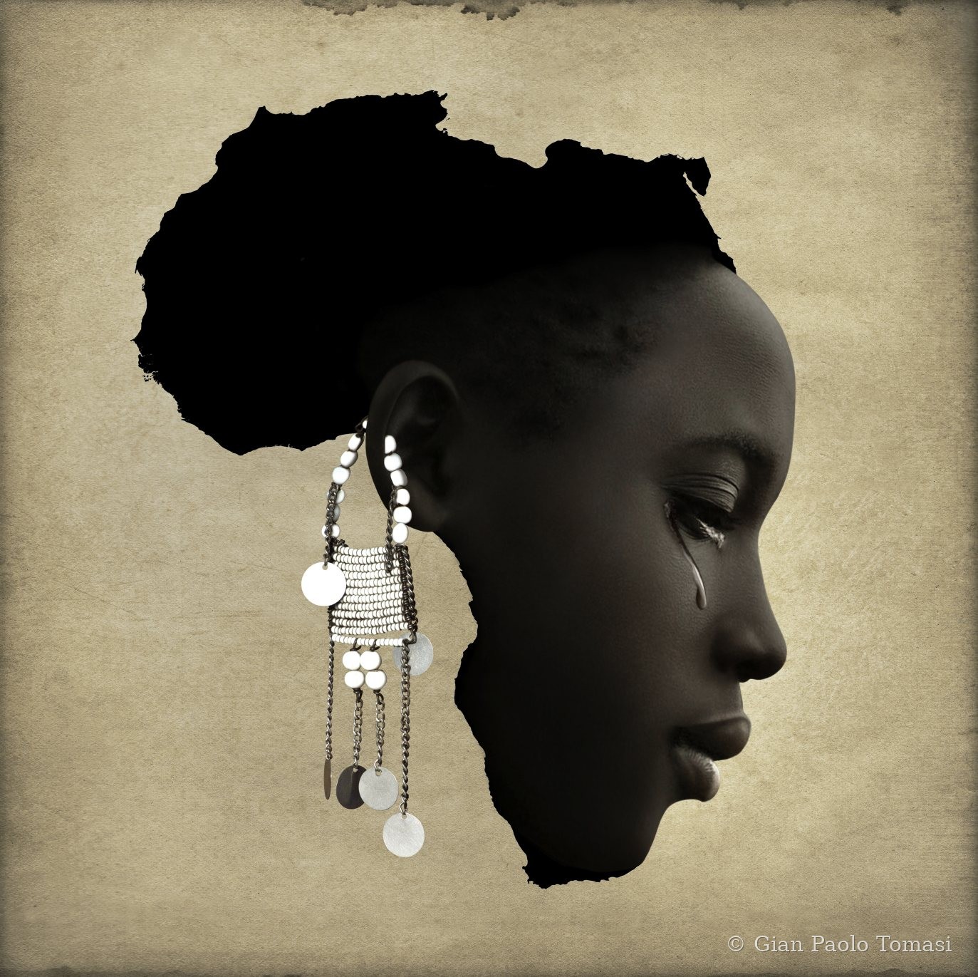 Profile of a woman whose head takes the shape of Africa, a tear on her cheek, In Art We Can